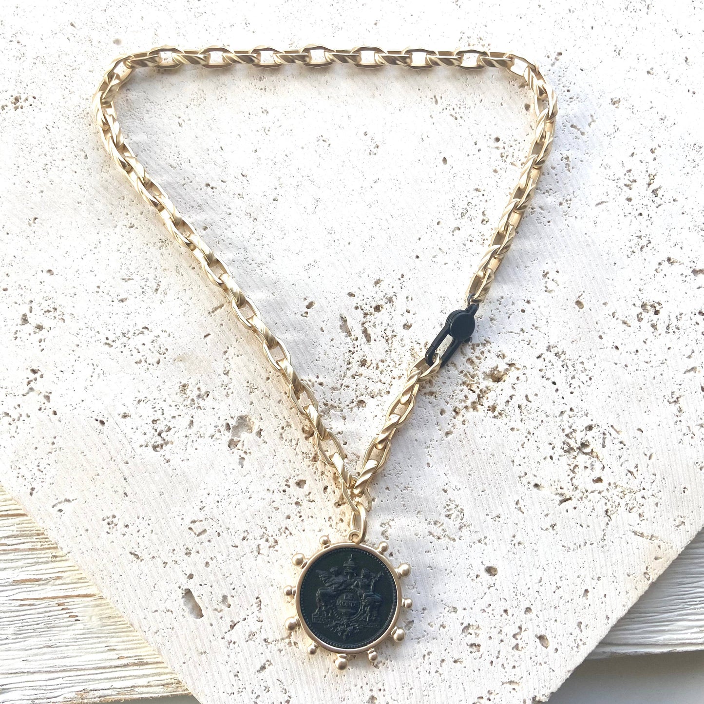 Matte gold coin necklace matte black clasp