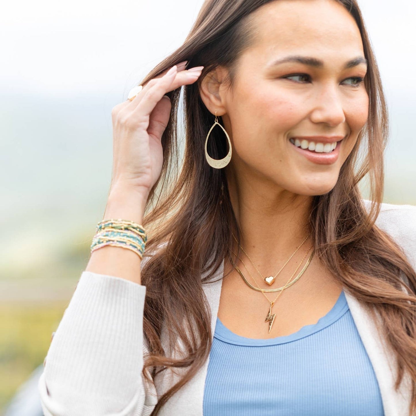 Long Gilded Teardrop Earrings: Silver