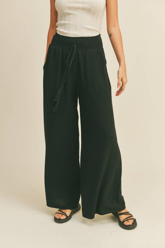 Black SMOCKED WAIST PANTS WITH TASSEL